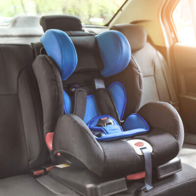 Child's car seat in the backseat of vehicle.