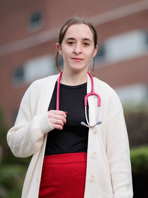 Photo of Alycin Smith in her nursing uniform.