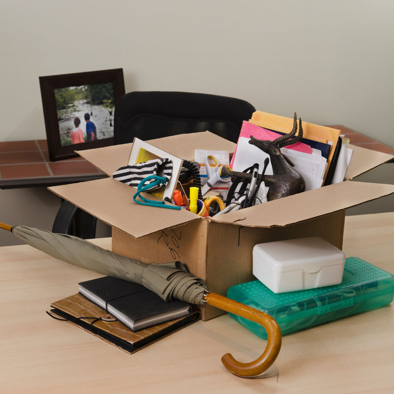 A cardboard box full of personal items.