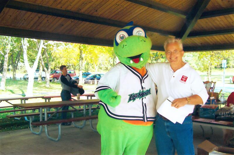 Vermont lake monsters mascot and Easterseals VT employee.