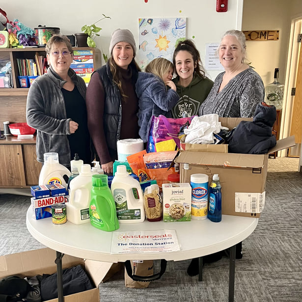 Table of donated goods from the poker hill pre k donation drive
