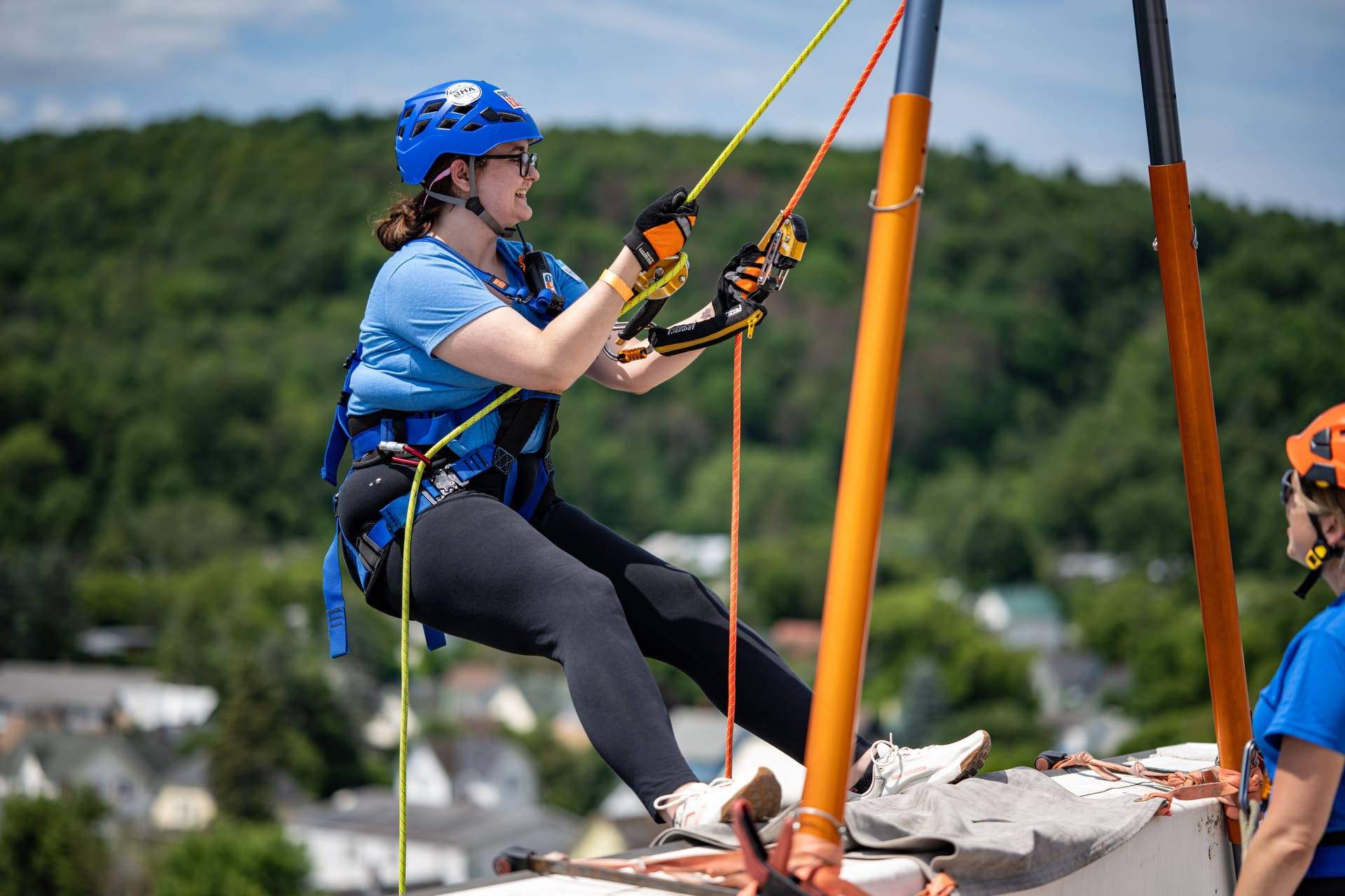 Person repelling at 2025 Easterseals VT Over the Edge event