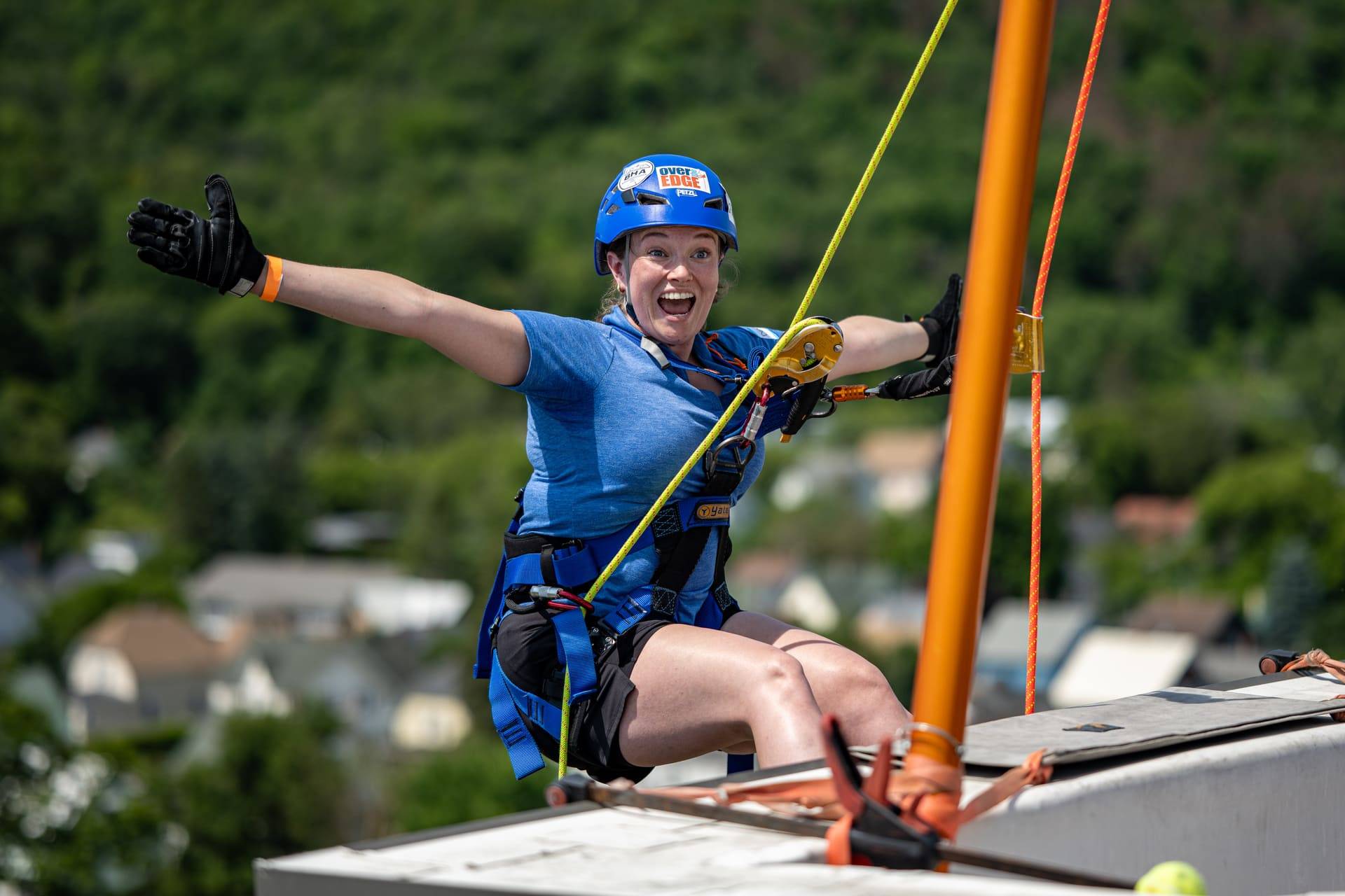 Person repelling at 2025 Easterseals VT Over the Edge event